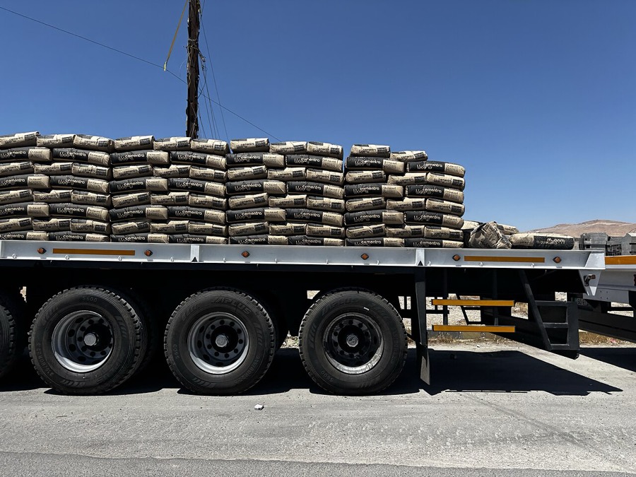 Truckload of stacked cement bags